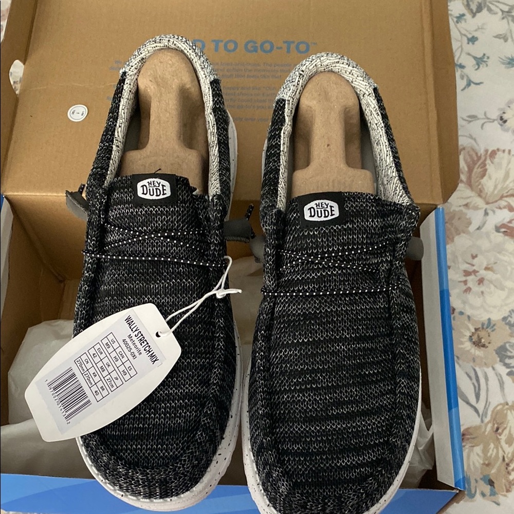 Hey Dude Black and White Slip-On Loafers with Modern Design